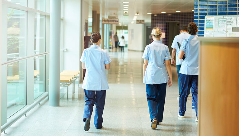 Nurses walking in corridor