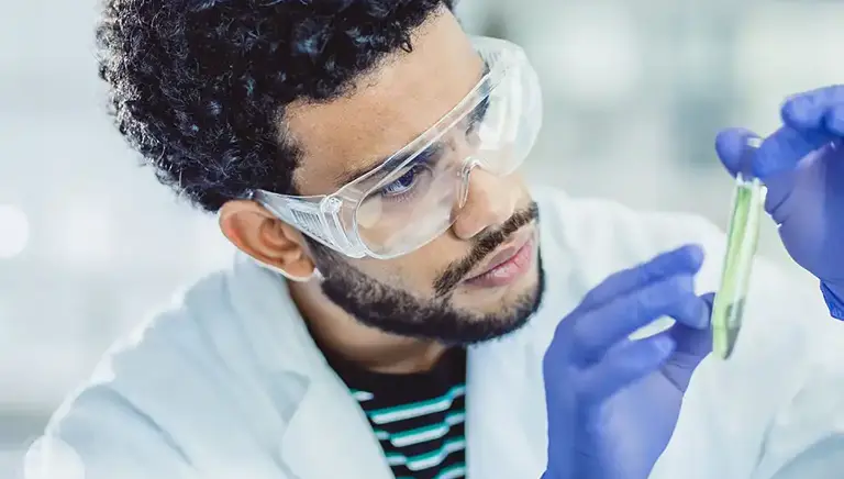 Scientist with vial